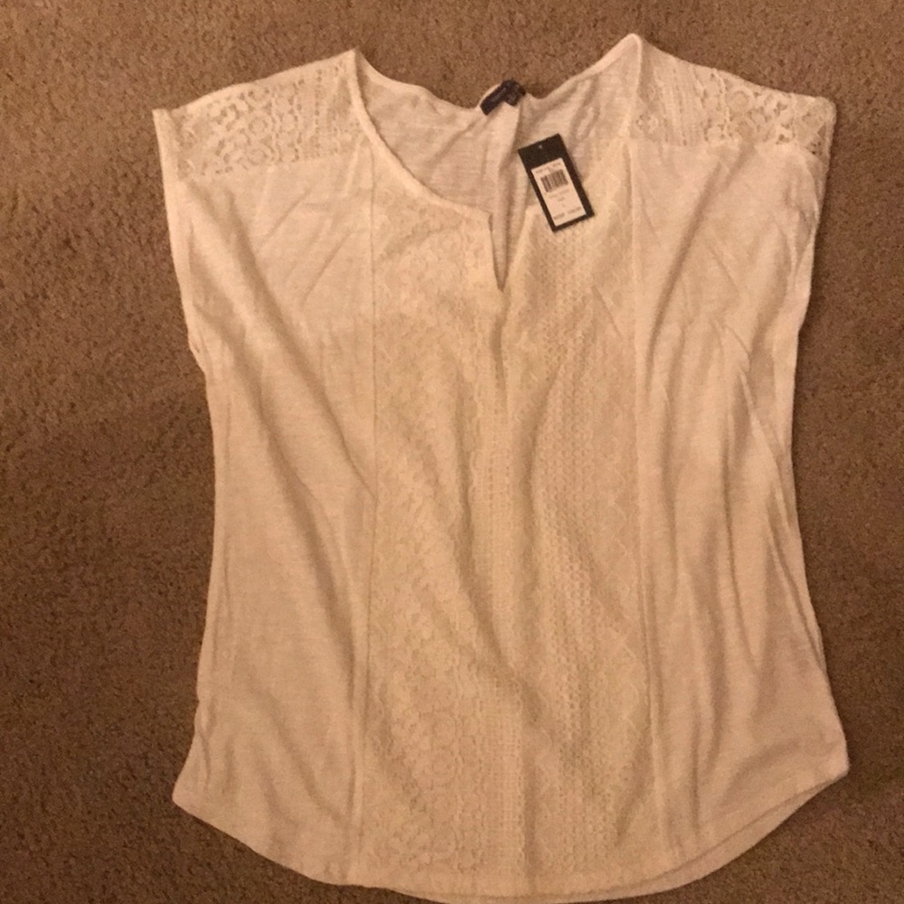Brand new Nice Ivory Blouse. Never warn